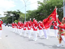 Bawa Bendera Pataka, IKA Unhas Bulukumba Ikuti Lomba Gerak Jalan HUT RI Ke 80